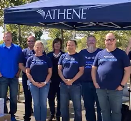 Athene employees under tent