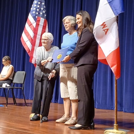Lilah Ness (left), Jane Pike (center), and Lieutenant Governor Chris Cournoyer (right).