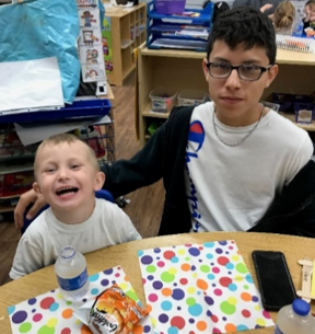 Book Buddy partnership Chase and Jose at Perry Child Development Center